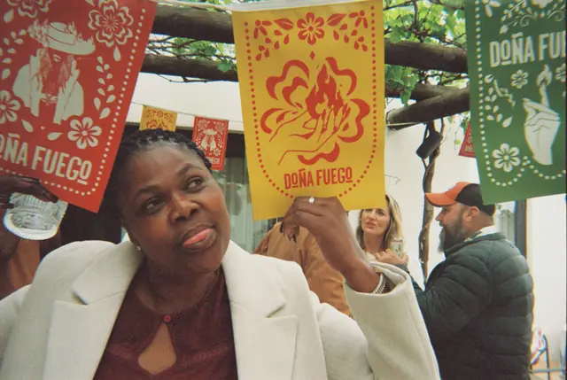 The flag, beside her face
