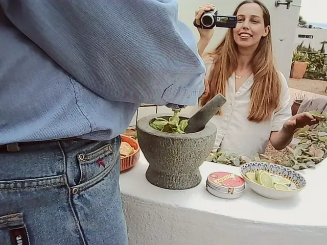 Pounding the guac, on camera